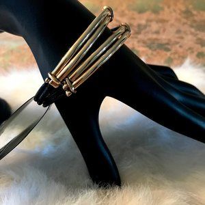 METAL GOLD AND  BLACK VINYL BRACELET NWT